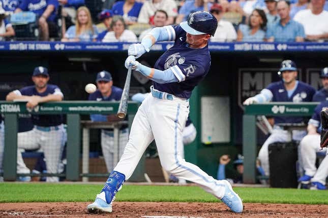 Jun 2, 2023; Kansas City, Missouri, USA; Kansas City Royals center fielder Drew Waters (6) hits a solo home run against the Colorado Rockies in the third inning at Kauffman Stadium.