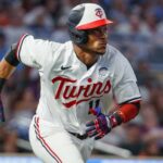 Jun 2, 2023; Minneapolis, Minnesota, USA; Minnesota Twins second baseman Jorge Polanco (11) hits an RBI double against the Cleveland Guardians in the seventh inning at Target Field.