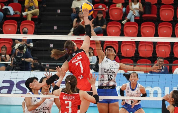 Ces Molina rises for a kill for Cignal. —AUGUST DELA CRUZ