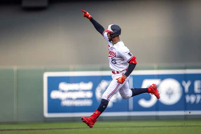 Jul 21, 2023; Minneapolis, Minnesota, USA; Minnesota Twins designated hitter Byron Buxton (25) celebrates hitting a three-run home run against the Chicago White Sox in the first inning at Target Field.