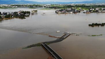 Deadly floods, mudslides bring southwestern Japan to a halt