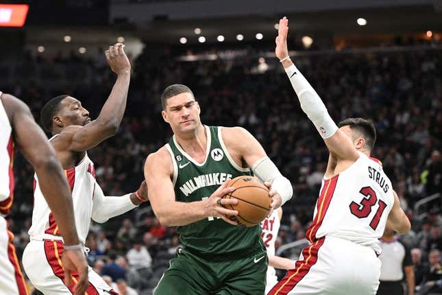 Apr 26, 2023; Milwaukee, Wisconsin, USA; Milwaukee Bucks center Brook Lopez (11) drives against Miami Heat during game five of the 2023 NBA Playoffs at Fiserv Forum.