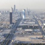 Saudi Arabia's economic growth slows as oil cuts, price drops bite into revenues