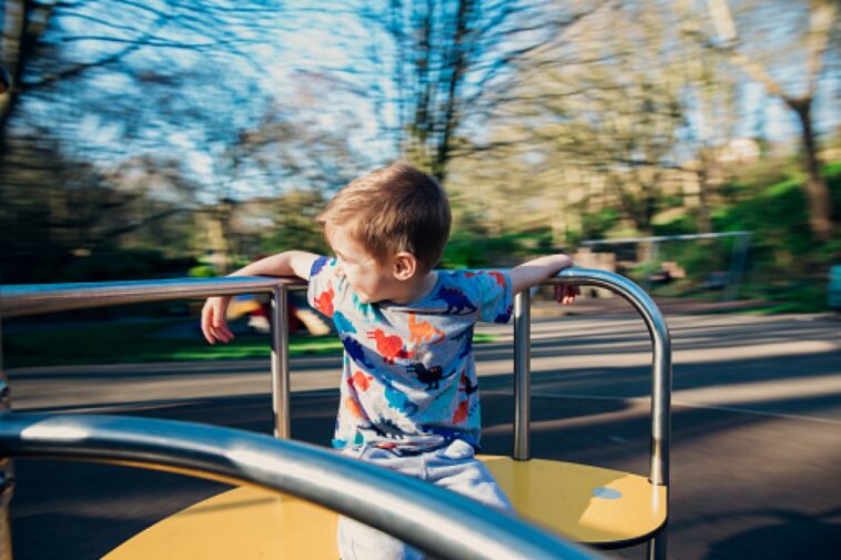 Playing on the Roundabout in the Park