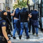 103 charged in deadly UCL fan violence in Greece