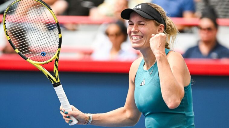 MONTREAL, QC - AUGUST 08: Caroline Wozniacki (DEN) reacts after her win after her first round match at WTA National Bank Open on August 08, 2023 at IGA Stadium in Montreal, QC (Photo by David Kirouac/Icon Sportswire) (Icon Sportswire via AP Images)