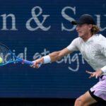 Max Purcell of Australia, hits a forehand to Carlos Alcaraz of Spain during the quarterfinals of the Western &amp;amp; Southern Open at the Lindner Family Tennis Center in Mason Friday, August, 18, 2023.