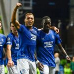 GLASGOW, SCOTLAND - AUGUST 22: Rangers' Abdallah Sima (R) celebrates with Cyriel Dessers after scoring to make it 1-0 during a UEFA Champions League play-off round first leg match between Rangers and PSV Eindhoven at Ibrox Stadium, August 22, 2023, in Glasgow, Scotland. (Photo by Rob Casey / SNS Group)