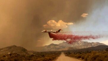 Photos: Firefighters contain a quarter of huge California-Nevada wildfire