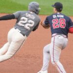 WASHINGTON, DC - SEPTEMBER 24: Matt Olson #28 of the Atlanta Braves tags out Dominic Smith #22 of the Washington Nationals trying to steal a base in the fifth inning during game one of a doubleheader at Nationals Park on September 24, 2023 in Washington, DC. (Photo by Mitchell Layton/Getty Images)