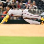 WASHINGTON, DC - SEPTEMBER 21: Ronald Acuna Jr. #13 of the Atlanta Braves slides into third base for a triple in the third inning against the Washington Nationals at Nationals Park on September 21, 2023 in Washington, DC. (Photo by Greg Fiume/Getty Images)