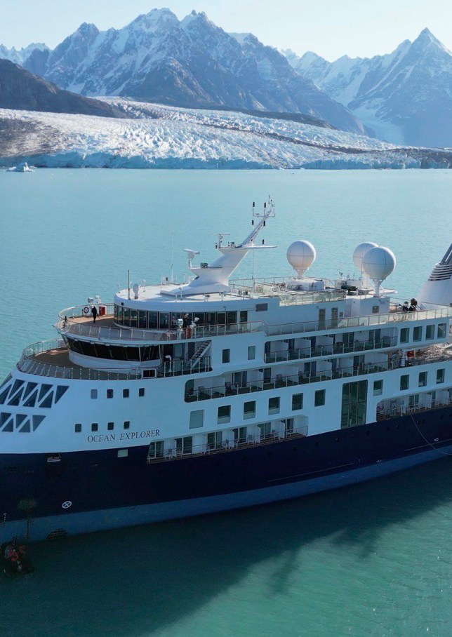 A view of the Ocean Explorer, a Bahamas-flagged Norwegian cruise ship with 206 passengers and crew, which has run aground in northwestern Greenland is pictured on Tuesday, Sept. 12, 2023. The 104.4-meter (343-foot) long and 18-meter (60 foot) wide Ocean Explorer ran aground on Monday in Alpefjord in the Northeast Greenland National Park. Another attempt to pull free a luxury cruise ship with 206 people that ran aground in the world???s northernmost national park has failed by using the high tide. It was the third attempt to free the MV Ocean Explorer. (SIRIUS/Joint Arctic Command via AP)