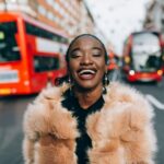 Portrait of modern black woman in Oxford Street in London, UK