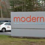 The Moderna logo is seen at the Moderna campus in Norwood, Massachusetts