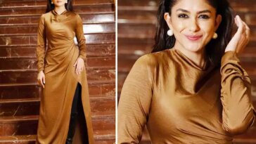 Mrunal Thakur exudes glamour in a brown thigh-high slit gown. See pics: