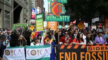 Tens of thousands rally in New York demanding end to fossil fuels