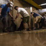 Two dead in Hong Kong amid extreme rain and flash floods that also struck southern China