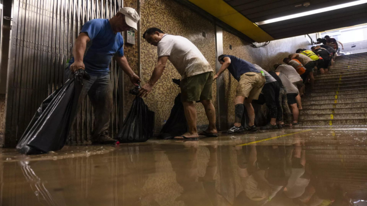 Two dead in Hong Kong amid extreme rain and flash floods that also struck southern China