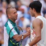 Dan Evans (L) of Great Britain shakes hands with Carlos Alcaraz of Spain after being defeated in their Men's Singles Third Round match on Day Six of the 2023 US Open at the USTA Billie Jean King National Tennis Center on September 02, 2023 in the Flushing neighborhood of the Queens borough of New York City. (Photo by Clive Brunskill/Getty Images)