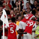 Arsenal players celebrate after Gabriel Martinelli's goal gave them a late win over Manchester City