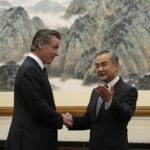 California Gov. Gavin Newsom has rare friendly exchange with China's senior diplomat Wang Yi