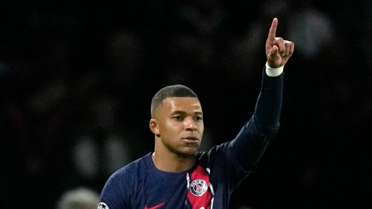 Kylian Mbappe inspired PSG to victory over Milan to move top of their Champions League group