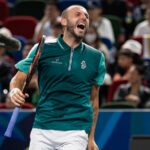 Dan Evans of Great Britain reacts during his match against Carlos Alcaraz of Spain in their men's singles round of 32 match on Day 8 of the 2023 Shanghai Rolex Masters at Qi Zhong Tennis Centre on October 09, 2023 in Shanghai, China. (Photo by Hugo Hu/Getty Images)