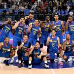 Philippines' players celebrate their win against Jordan at the men's gold medal basketball game between Jordan and Philippines during the 2022 Asian Games in Hangzhou in China's eastern Zhejiang province on October 6, 2023. (Photo by William WEST / AFP)