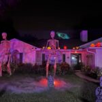 Story from Jam Press (Extreme Halloween Display) Pictured: The haunted Halloween yard. 'I've spent $7,000 on my haunted Halloween yard so far ??? it takes me 80 HOURS to set up' A man who has spent $7,000 (??5,800) on spooky decorations for his front yard says it takes him 80 hours to set up his haunted display ??? and he starts planning it during summer. Tyler Bello, 29 is a self-confessed ???Halloween junkie??? and spends hours creating the perfect horror scene. With preparations for the scary season starting as early as July, Tyler and his wife, Kelsey, let their imaginations run wild with fog machines, lights, and even a transmitter to allow passersby to hear the haunted sounds from their cars. Dubbed Blackwood Mortuary, the couple first began their project in 2022 and it has become a huge hit with locals and online with over 51,800 likes (@blackwoodmortuary). ???I love creating a fun and spooky experience for the neighbourhood and enjoy seeing their reactions to the decorations,??? Tyler told NeedToKnow.co.uk. ???It's a fun way to embrace the Halloween spirit and bring the community together. ???I grew up going to the local theme parks and seeing the larger-than-life [horror] displays. ???I knew it was something I wanted to do personally one day. ???When I was younger, I convinced my parents to build a small haunted house in our garage for Halloween. ???[After that], I was hooked. ???The designing, planning, and execution was such a rush.??? Both software consultants Tyler, and Kelsey, have previously worked in theme parks, so the pressure to create an impressive scene with intense detail was high. Tyler, who ???never stops thinking about Halloween??? begins researching ideas in March. He tries out different techniques months before the spooky season even begins. He said: ???We frequently visit local Halloween attractions and I???ve always been fascinated with the idea of building a haunted house. ???Since a full-blown haunted house is a ton