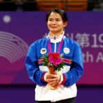 Asian Games - Hangzhou 2022 - Ju-jitsu - Xiaoshan Linpu Gymnasium JJI, Hangzhou, China - October 5, 2023 Gold medalist Philippines' Meggie Ochoa poses during the medal ceremony for the Women's 48Kg