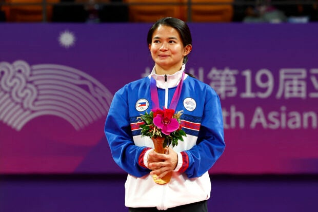 Asian Games - Hangzhou 2022 - Ju-jitsu - Xiaoshan Linpu Gymnasium JJI, Hangzhou, China - October 5, 2023 Gold medalist Philippines' Meggie Ochoa poses during the medal ceremony for the Women's 48Kg