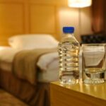 Flight attendant says you should always throw a water bottle under hotel beds