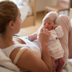 Mother with her newborn baby in the hospital