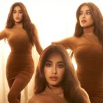 Janhvi Kapoor looks mesmerising in a stunning brown bodycon dress. See pics