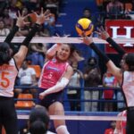 Creamline’s Risa Sato (center) fires a kill against the Farm Fresh wall. —AUGUST DELA CRUZ