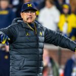 The problem with suspending Jim Harbaugh