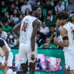 UP Fighting Maroons' Malick Diouf and Francis Lopez in the UAAP men's basketball Finals Game 1.