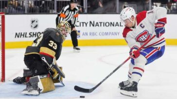 LAS VEGAS, NEVADA - OCTOBER 30: Nick Suzuki #14 of the Montreal Canadiens scores a shootout goal against Adin Hill #33 of the Vegas Golden Knights in overtime of their game at T-Mobile Arena on October 30, 2023 in Las Vegas, Nevada. The Golden Knights defeated the Canadiens 3-2 in a shootout. (Photo by Ethan Miller/Getty Images)