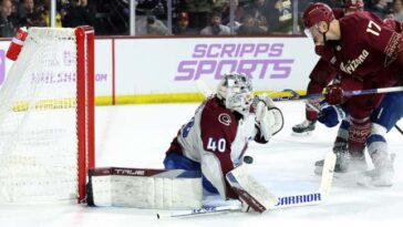 TEMPE, ARIZONA - NOVEMBER 30: Nick Bjugstad #17 of the Arizona Coyotes scores the game winning goal against Alexandar Georgiev #40 of the Colorado Avalanche during the overtime period at Mullett Arena on November 30, 2023 in Tempe, Arizona. (Photo by Zac BonDurant/Getty Images)