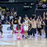 Coach Haydee Ong,  Tantoy Ferrer and the UST Growling Tigers celebrate UAAP Season 86 women's basketball title. –MARLO CUETO/INQUIRER.net