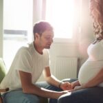 Stressful couple awaiting baby faced with difficulties requiring understanding