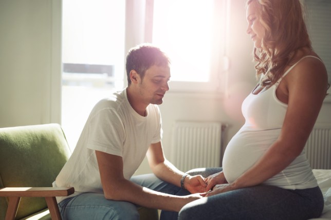 Stressful couple awaiting baby faced with difficulties requiring understanding