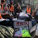 Serbian students block roads to protest Vucic party victory