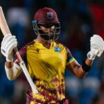 West Indies' Shai Hope celebrates hitting a six from a delivery of England's Chris Woakes..to win by 4 wickets the fifth T20 cricket match at Brian Lara Stadium in Tarouba, Trinidad and Tobago, Thursday, Dec. 21, 2023. (AP Photo/Ricardo Mazalan)