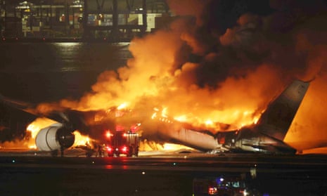 A Japan Airlines (JAL) passenger plane bursts into flames on the tarmac at Haneda Airport in Tokyo, Japan.