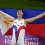 Philippines' EJ Obiena celebrates after winning the men's pole vault final at the 19th Asian Games in Hangzhou, China, Saturday, Sept. 30, 2023. (AP Ph