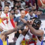 Magnolia’s Calvin Abueva (left) fouls San Miguel big man Mo Tautuaa hard during their matchup in Game 2. Abueva later fifigured in a verbal altercation with Tautuaa’s wife after the game. —AUGUST DELA CRUZ