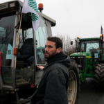 French farmers lift road blockades around Paris after the prime minister offers a support plan