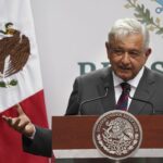 Mexico's president defends disclosing reporter's phone number, saying the law doesn't apply to him