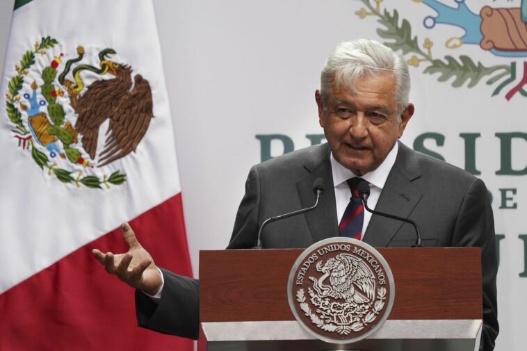 Mexico's president defends disclosing reporter's phone number, saying the law doesn't apply to him